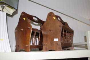 A pair of oak magazine racks