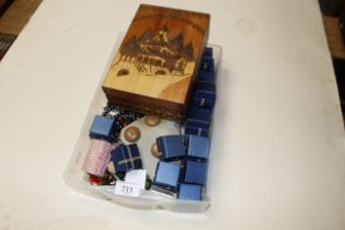 A tray and wooden box containing gemstones and cos