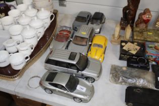 A quantity of model cars including Porsche, Audi,