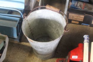 A galvanised bucket with swing handle (148)