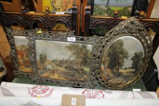 Four ornate metal framed embroidered picture of Co