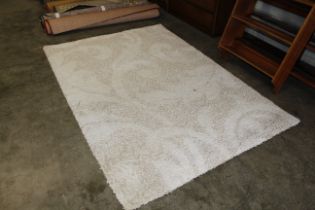 An approx. 7'8" x 5'4" wool rug