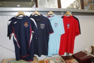 Three West Ham United football shirts and an Engla