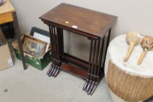 A nest of four Edwardian inlaid tables