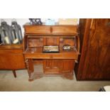 An unusual mahogany dome topped writing desk AF
