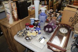 A tall glass vase, blue and white vase, glass dish