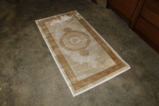 An approx. 5' x 2'8" Eastern wool rug