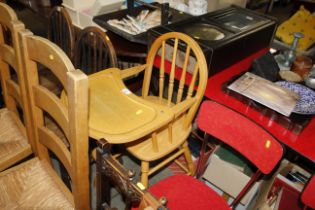 A wooden child's highchair