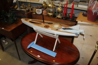 A model yacht on stand