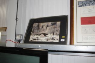 A framed print of a winter scene in Central Park, New York