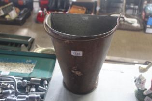 A wall mounting bucket / planter with swing handle