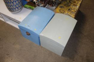 Two wooden domed topped storage boxes