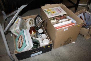 A box of miscellaneous books and a box of miscella