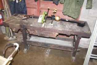 A wooden work bench fitted Parkinson's bench vice