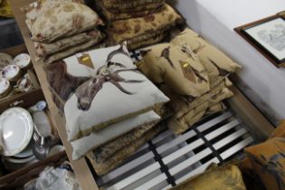 A quantity of various cushions
