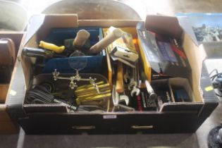 A box coining a quantity of tools including allen