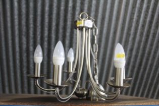 A five branch metal ceiling light fitting