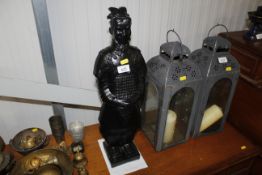 A black resin Oriental statue