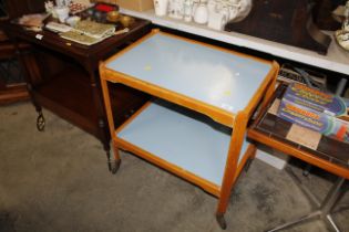 A two tier Formica topped tea trolley
