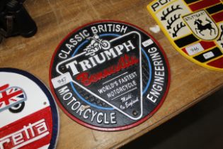 A cast iron Triumph Bonneville motorcycle sign (19