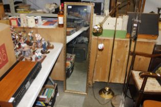 A gilt framed oblong mirror