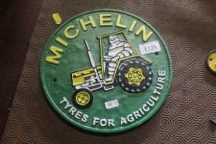 A circular "Michelin on Tractor" sign (163)