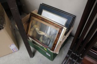 A box of various prints, photographs etc.