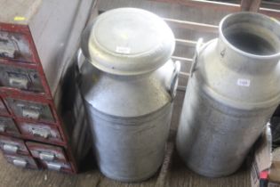 An aluminium twin handled milk churn with lid