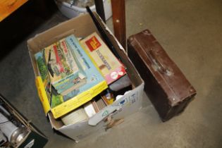 A box of vintage toys to include Skyliner sports car, Tri-ang Railways clockwork trainset, etc. sold