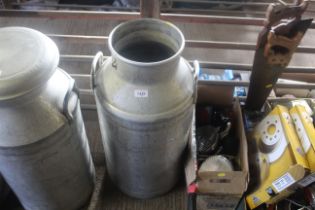 An aluminium twin handled milk churn lacking lid