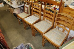 A set of four ladder back chairs