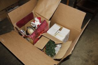 A box of various Christmas decorations