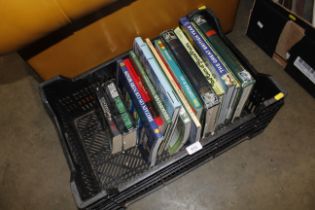 A box of various gardening related books etc.