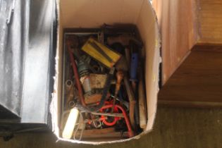 A box containing various tools to include a Halfor