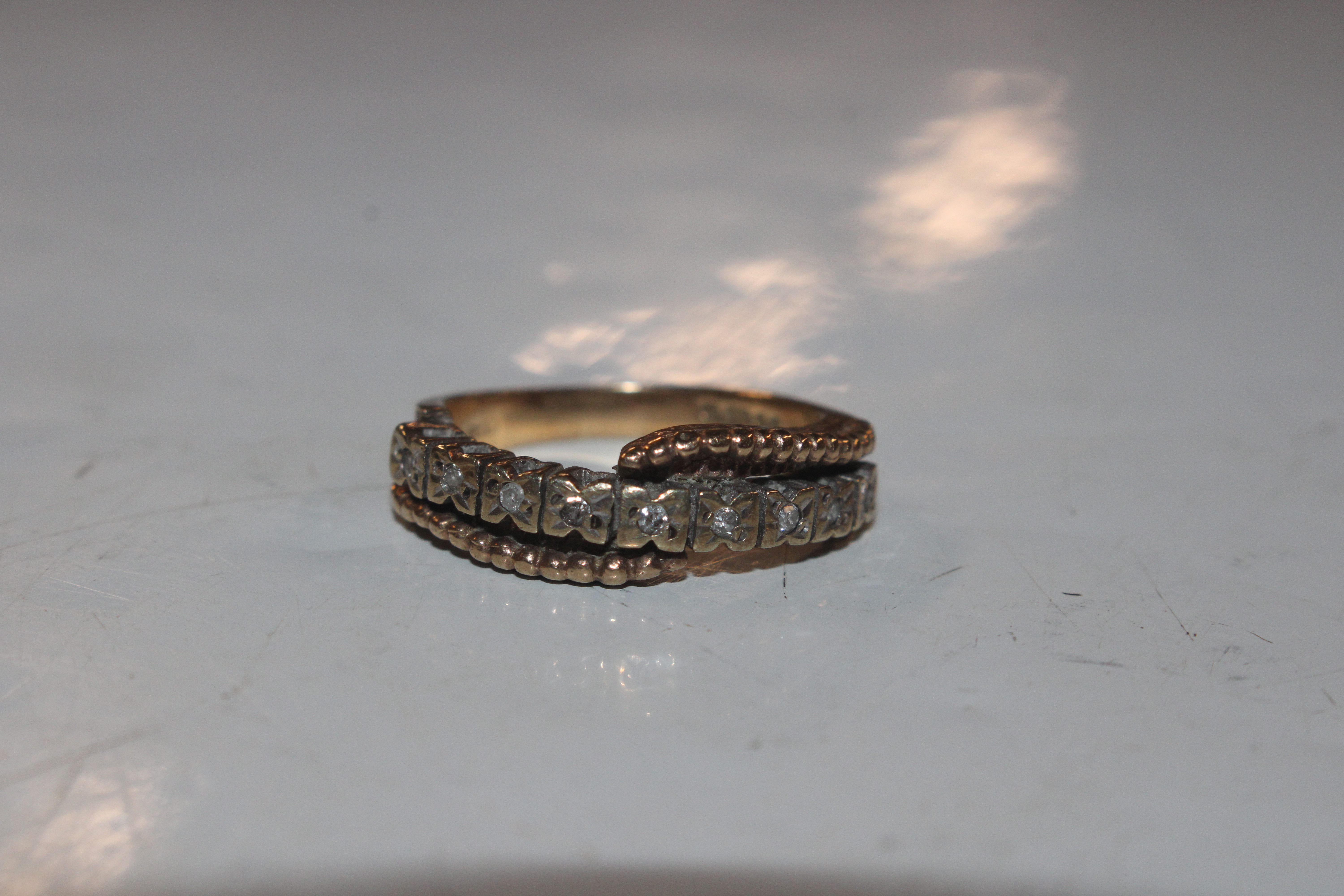 A 9ct gold half eternity ring set with chip diamon - Image 7 of 10