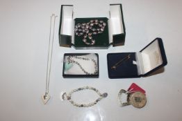 A box of jewellery to include pearl necklace, othe
