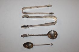 Two pairs of silver sugar tongs and two silver spo