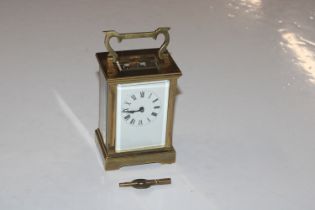 A brass cased carriage clock