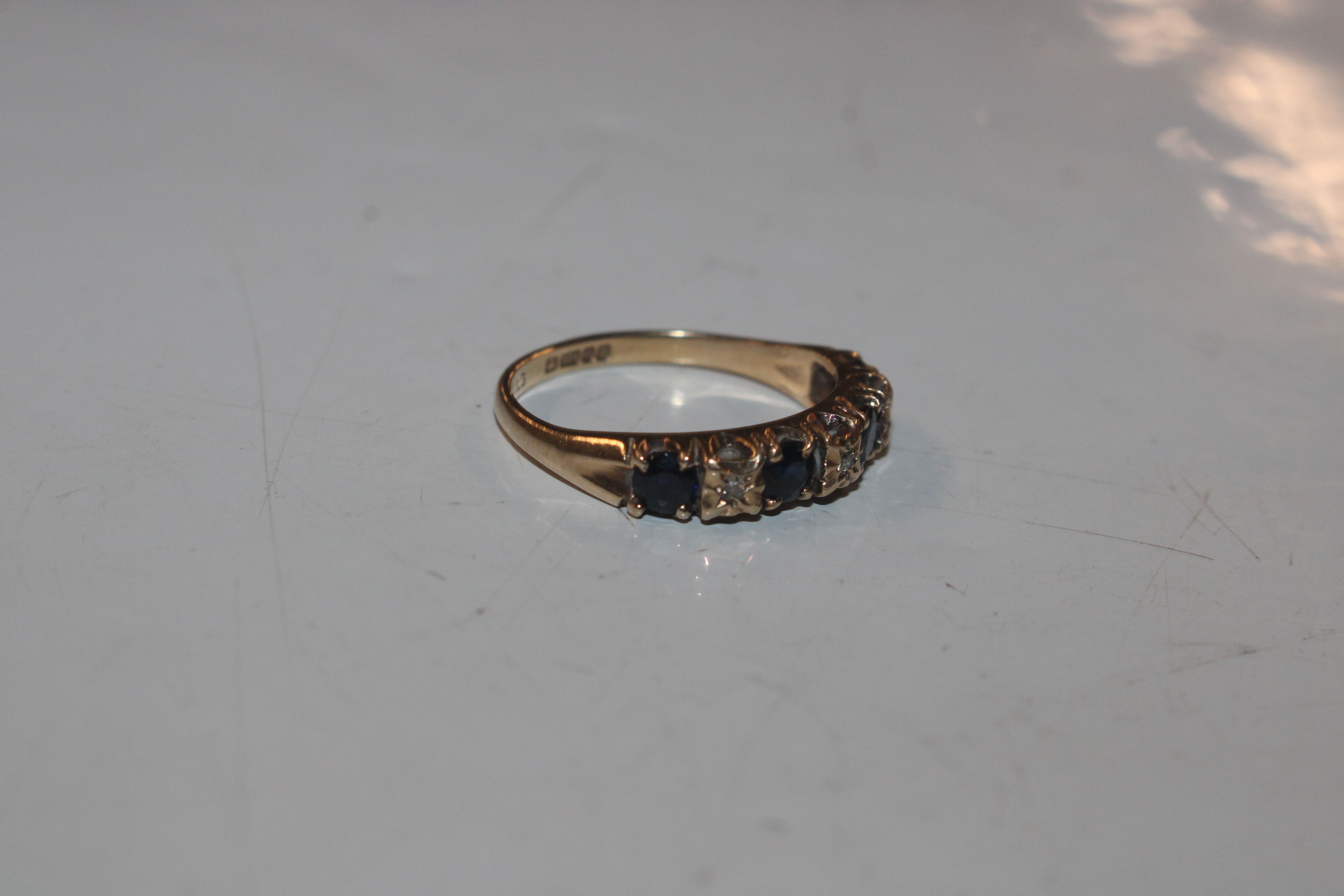 A 9ct gold half eternity ring set with chip diamon - Image 2 of 10