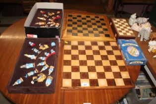 An Alice in Wonderland chess set; two chess boards