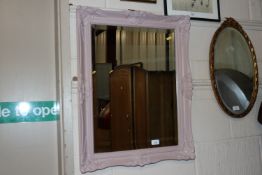 A painted Global Trading Company mirror