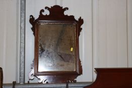 A mahogany Chippendale style wall mirror