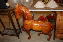 A wooden vintage fairground style horse