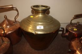 A large Indian brass vessel