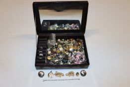 A jewellery box and contents of costume jewellery