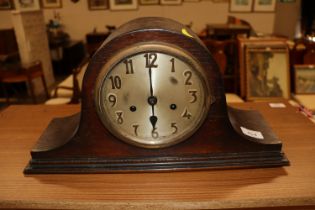 A 1930's oak cased mantel clock
