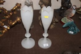 A pair of Victorian white opaque glass vases
