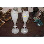 A pair of Victorian white opaque glass vases