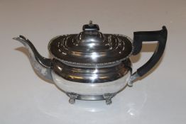 A silver plated teapot