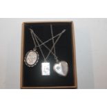 An Adie & Lovkin locket and two others, approx. to